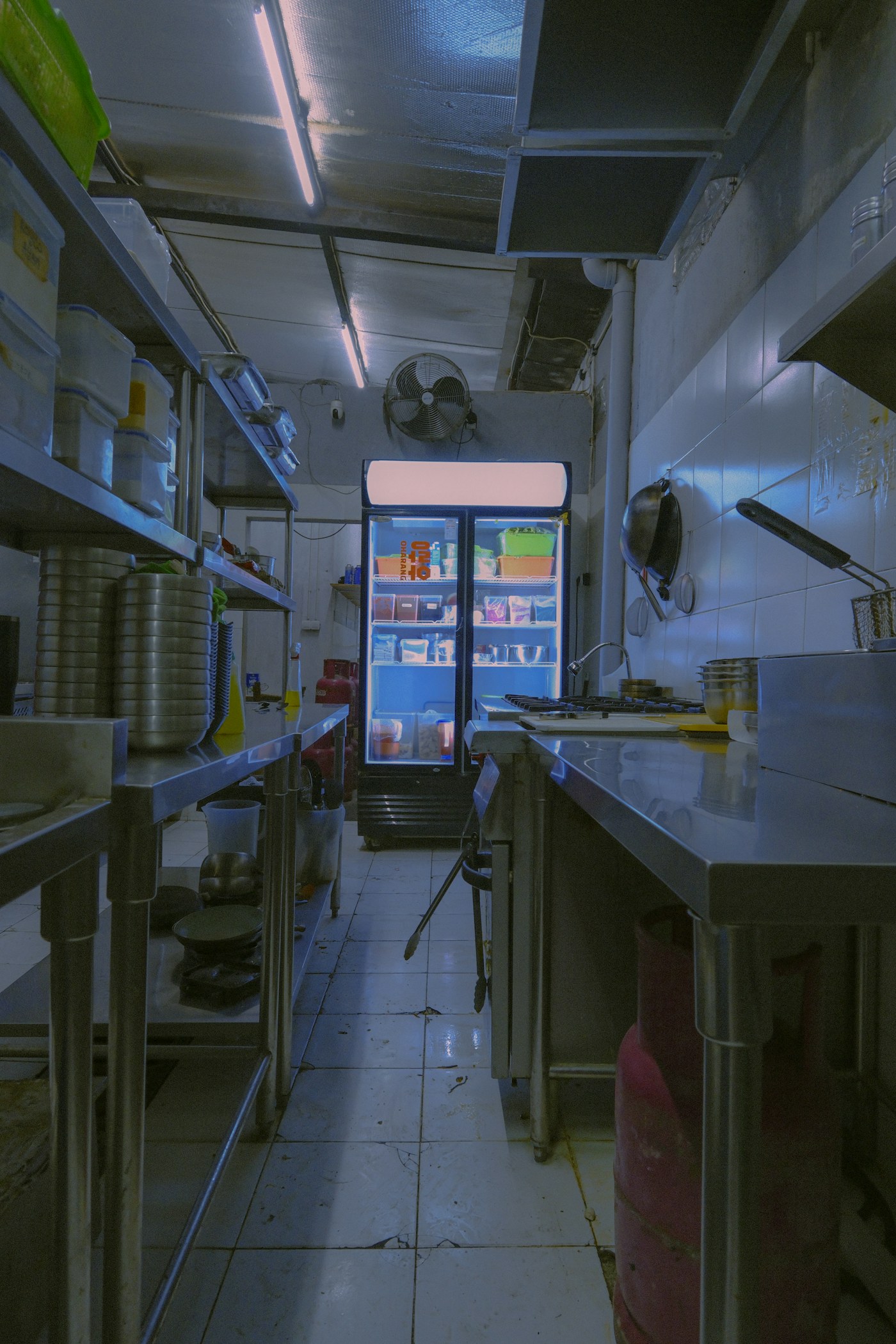High-specification stainless-steel commercial kitchen with professional cooking and refrigeration equipment